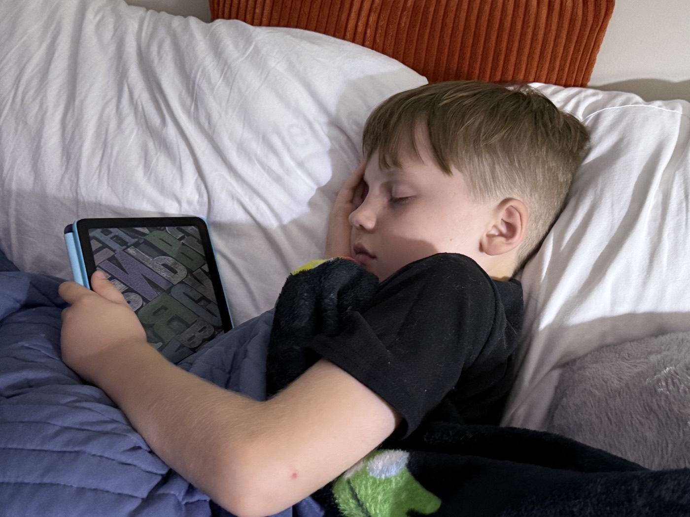 One of the boys listening to a story before bed