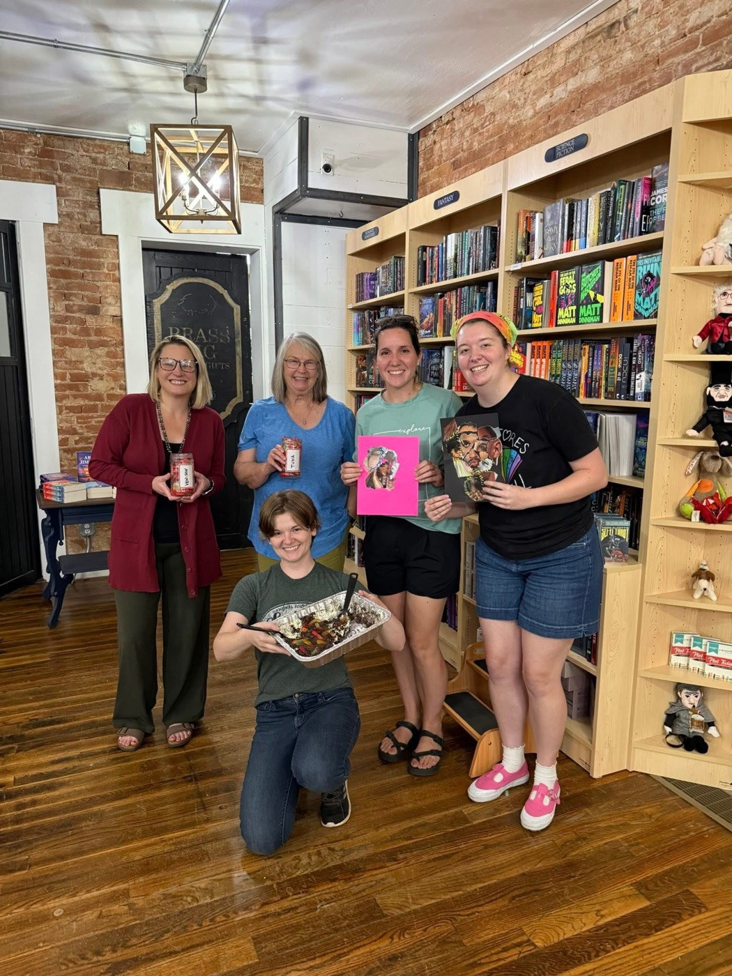 The audiobook club posing together at the bookstore